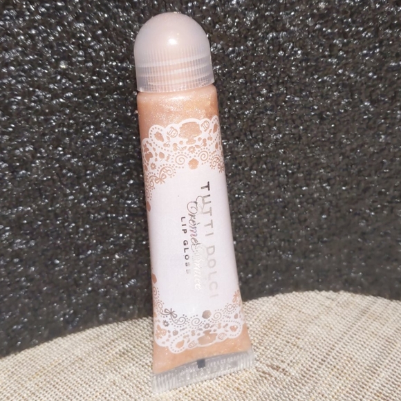 Bath & Body Works Other - Tutti dolci creme brulee lip gloss RARE